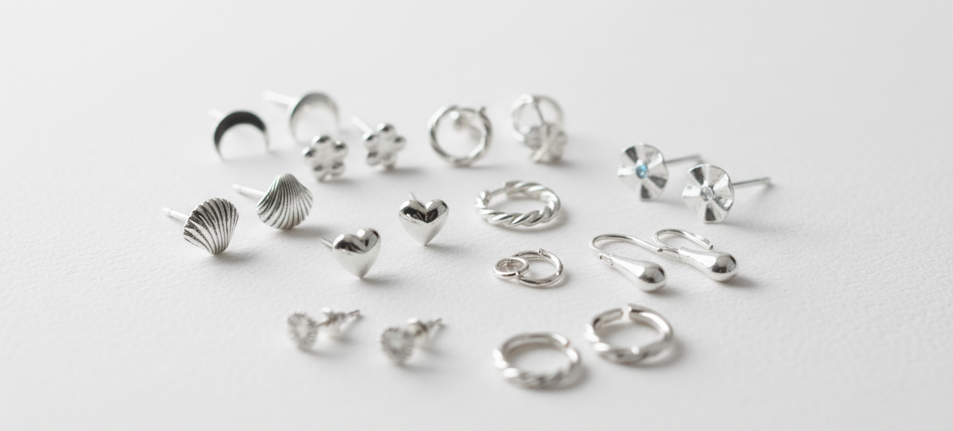 Rodzaje bigli i zapięć – jak dobrać idealne wykończenie do kolczyków? Różnorodne bigle i kolczyki srebrne